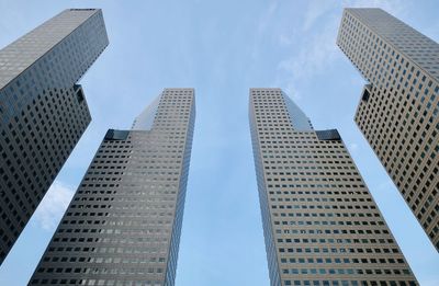 Low angle view of modern buildings against sky