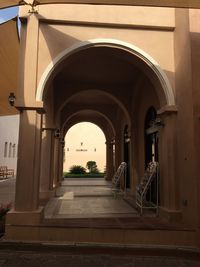 Archway leading towards building