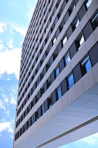 Low angle view of modern buildings against sky