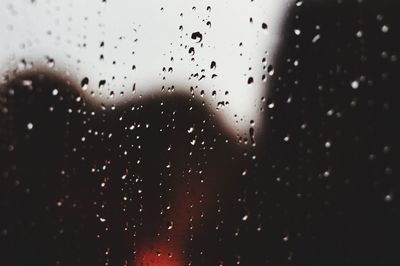 Close-up of raindrops on window