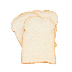 Close-up of bread against white background