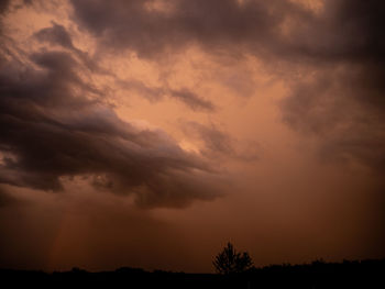 Low angle view of dramatic sky during sunset