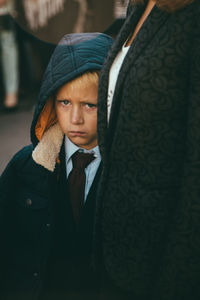 Portrait of young boy outdoors