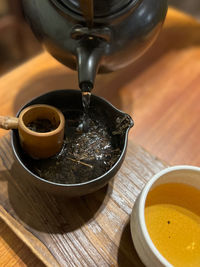 Close-up of making tea on table