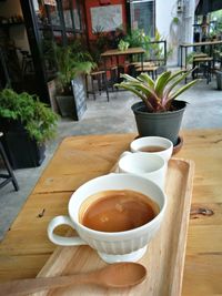 Close-up of coffee served on table