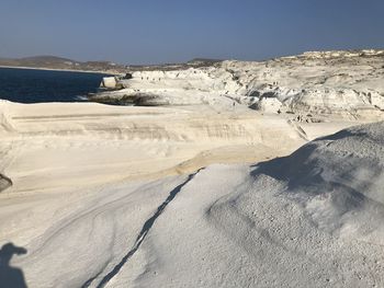 Scenic view of land against clear sky