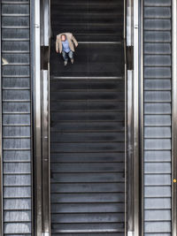 Man on escalator