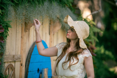 Young woman wearing hat