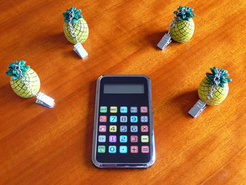 High angle view of smart phone on table