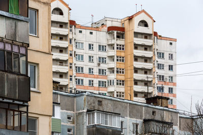 Low angle view of residential buildings against sky