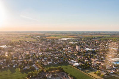 Aerial view of cityscape against clear sky