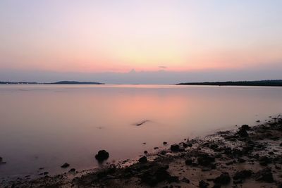 Scenic view of sunset over river