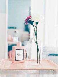Close-up of flower vase on table