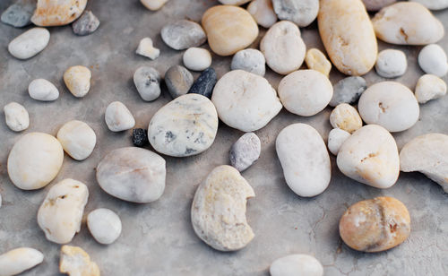 High angle view of pebbles on table