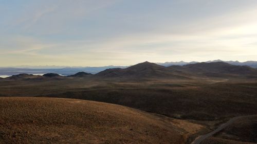 Scenic view of landscape against sky during sunset