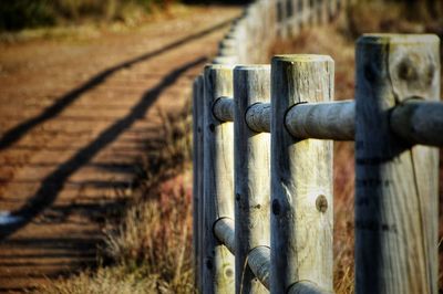 Close-up of metal fence on land