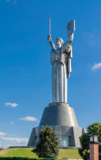 Motherland monument illuminated by the sun, kiev, ukraine, july 2020