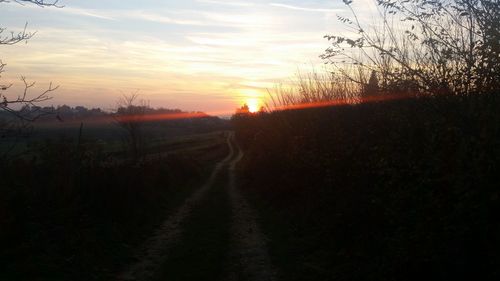 Scenic view of landscape at sunset