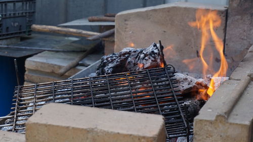 Close-up of fire on barbecue grill