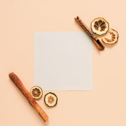 Directly above shot of table against white background