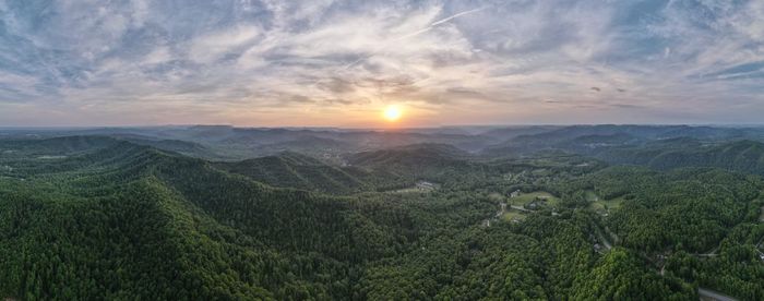 Scenic view of landscape against sky during sunset