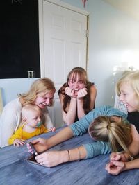 Siblings playing at home