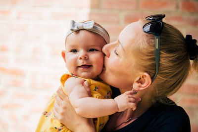 Portrait of mother with baby