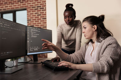 Business colleagues working at office