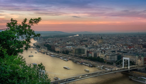 High angle view of bridge over river at sunset