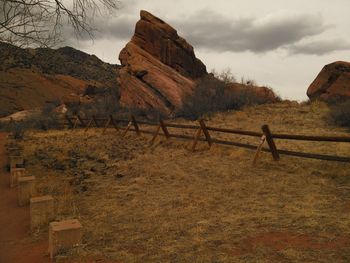 Scenic view of dramatic sky over landscape