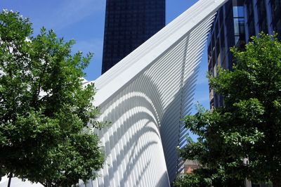 Low angle view of modern buildings against sky