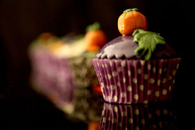 Close-up of fruit over black background