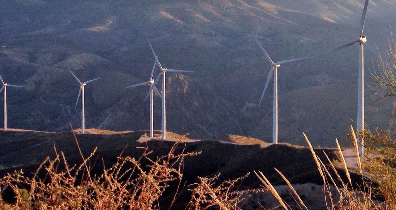 wind turbine, alternative energy, fuel and power generation, wind power, renewable energy, windmill, environmental conservation, landscape, technology, field, tranquility, rural scene, mountain, tranquil scene, nature, traditional windmill, day, scenics, non-urban scene, electricity