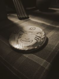 High angle view of clock on table