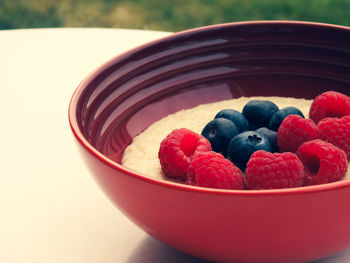 Close-up of strawberries in bowl on table