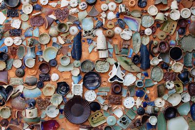 Full frame shot of pottery pieces on table