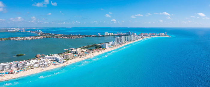 High angle view of sea against blue sky