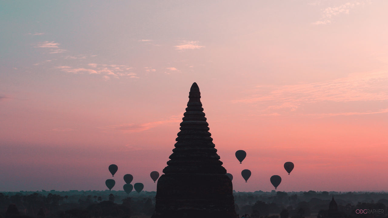 VIEW OF BALLOONS AT SUNSET