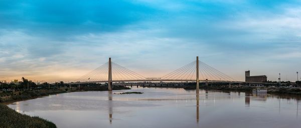 Bridge over sea against sky