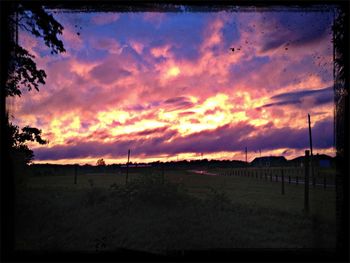 Silhouette landscape against sky during sunset