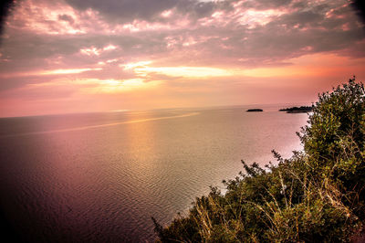 Scenic view of sea against sky during sunset