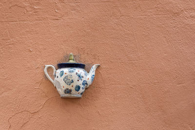 Close-up of metallic object on wall