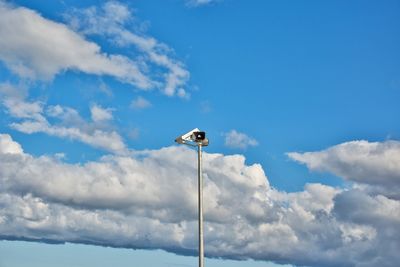 Low angle view of megaphone on the beach against sky