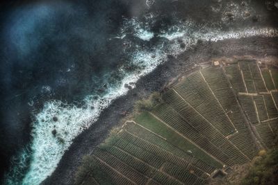 Close-up of water on beach against sky