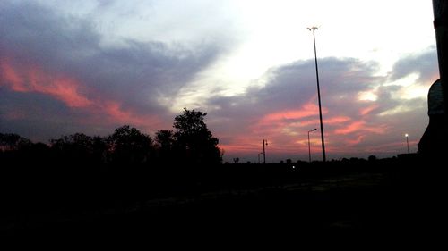 Scenic view of landscape against cloudy sky