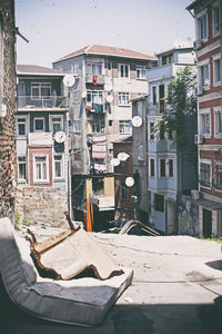 Empty alley with buildings in background