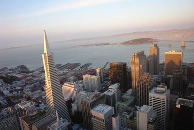 High angle view of city buildings during sunset