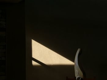 Sunlight falling on wall in building