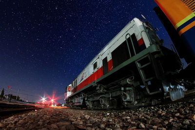 Low angle view of train at night