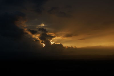 Scenic view of dramatic sky during sunset